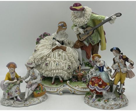 Continental 19thC porcelain to include  two Sitzendorf figure groups tallest with sheep 18cm together with a group of a court