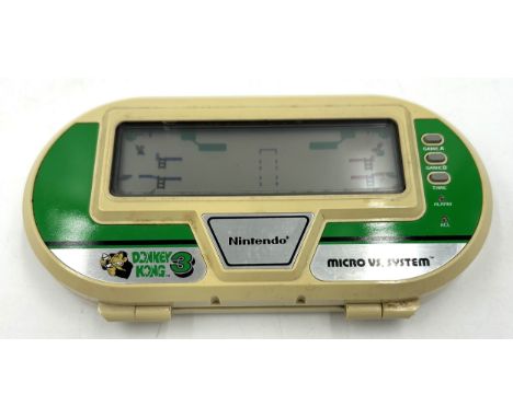A Nintendo Micro VS. System - Donkey Kong 3 AK-302, a 1984 handheld games console.