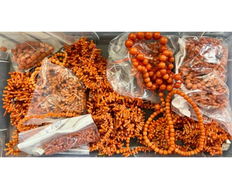 A large quantity of vintage coral beads, some in need of rethreading. One necklace with 9 carat gold clasp.