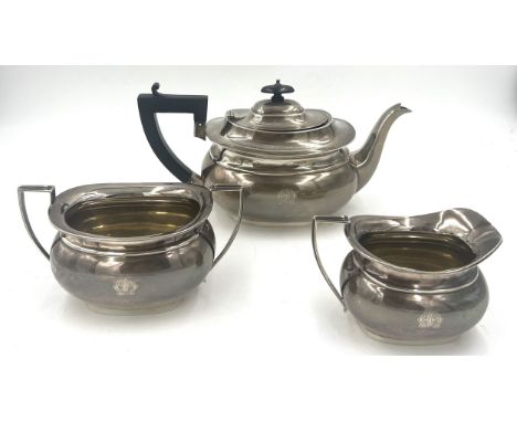 Three piece silver tea service, teapot with ebony knop and handle. Birmingham 1923, maker Williams Ltd. Total weight 946gm.