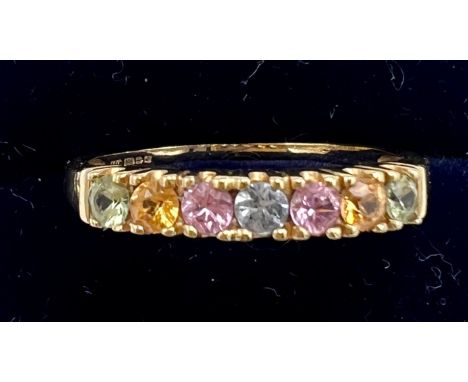 A nine carat gold gem set ring. Size R. Weight 2gm.