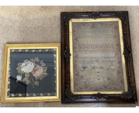 A 19thC sampler by Isabella Cuthbertson Aged 11 1859, in a decorative contemporary frame, 41 x 28cm, together with a 19thC wo