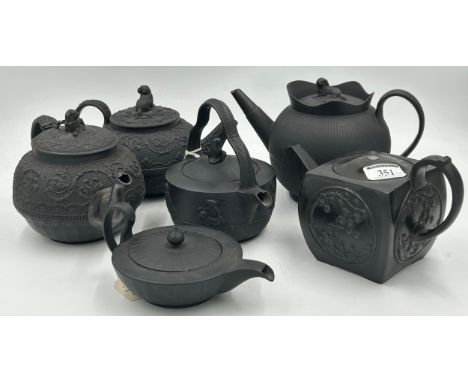 A group of early 19th century black basalt Spode (and one other) teapots c. 1810. Including one of kettle form and one with d