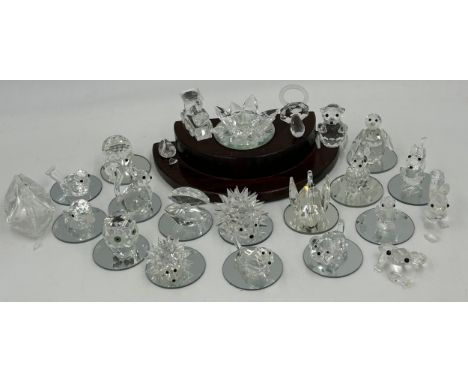 A collection of Swarovski crystal animals etc. to include 2 x hedgehogs, owl, penguin, 3 x birds, 3 x squirrels, pig, rabbit,