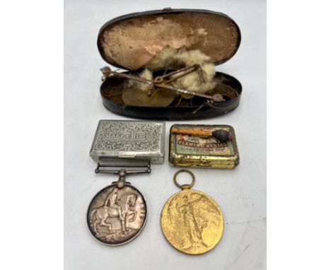 Two WWI medals for 79367 GNR. A. HUSCROFT. M.G.C, snuff box, vesta case and match and 19thC scales in original case.