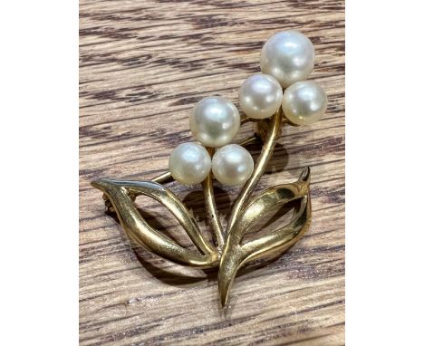 A 9 carat gold and cultured pearl brooch. 3cm l. Weight 4gm.