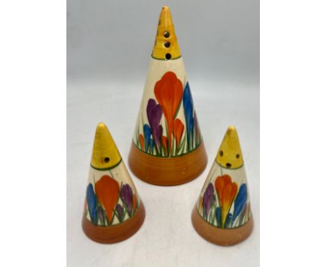 A pair of Clarice Cliff Bizarre crocus pattern salt, pepper and sugar shaker, 14cm h.