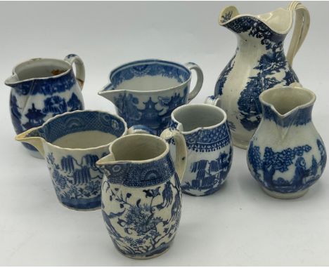 A group of early 19th century blue and white transfer-printed cream jugs, c. 1800. To include: Spode Queen Charlotte, Gallopi