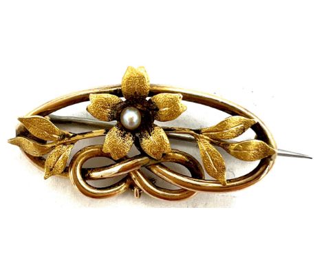 A 15 carat gold brooch set with seed pearl. 3.5cm l. Weight 3.6gm.