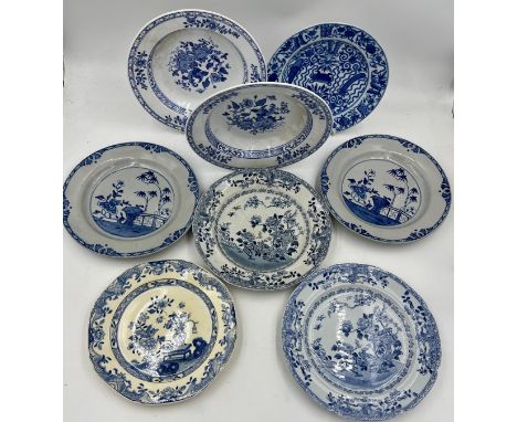 A group of early 19th century blue and white transfer-printed plates, some Spode, as Chinese replacements, c. 1800-20. Larges