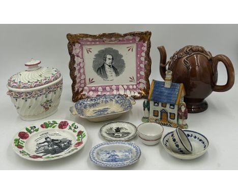 A collection of early 19thC pottery to include a Sunderland lustre dish of Sir R. Peel. Bart 22 x 19cm , a Prattware money bo