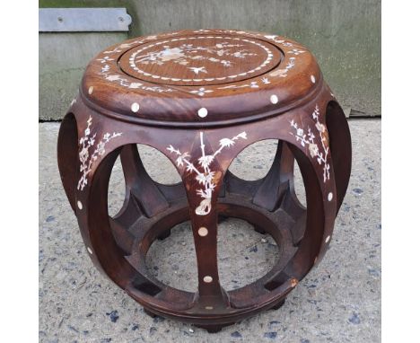 An Indian hardwood table inlaid with mother of pearl. 35cm h x 38cm w x 38cm d.