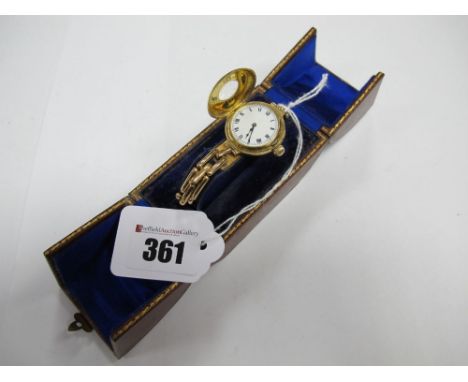 An 18ct Gold Cased Ladies Wristwatch, with half hunter style case, the white enamel dial with black Roman numerals, the movem