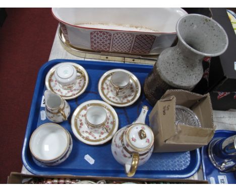 A Continental China Three Setting Tea Service, with teapot, sugar and milk, with hand painted rose head swags and gilt border