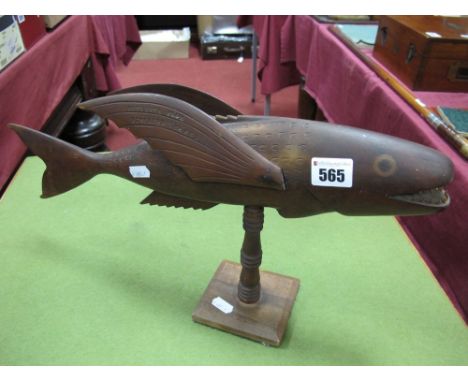 A Santa Islands Hand Carved Model Fish, open mouth with teeth, the winged fins stamped 'Souvenir from Pitcairn Islands: Made 