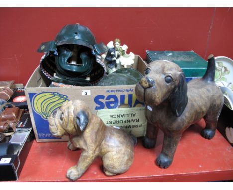 Christmas Teapot, two carved wooden dogs, metal helmets, figure group. 