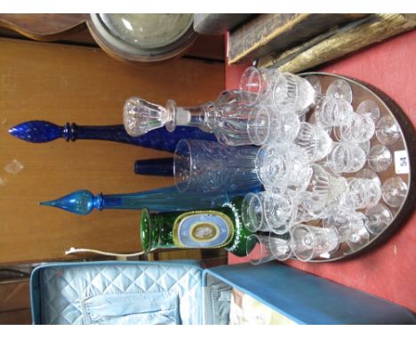 A Victorian Decanter, of ribbed mallet form, a Victorian green glass vase with gilt and enamel decoration, blue glass vases, 