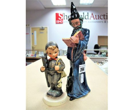 A Royal Doulton Figure "The Wizard" HN2877, printed mark to base, and a Goebel "Chimney Sweep" figure. (2)