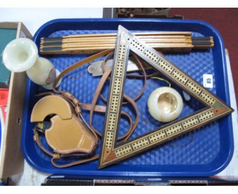 A Stanley of London Surveyor's Dial, in tan case, an early XX Century triangular cribbage board, folding Chesterman's rule, f