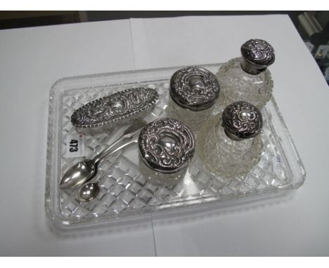 Hallmarked Silver Topped Glass Scent Bottles, dressing table jars, trinket pot, glass dressing table tray and three spoons.