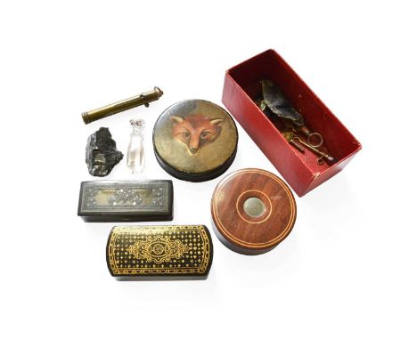 A 19th Century Papier Mache Circular Snuff Box, painted to the cover with a fox mask, a similar mahogany inlaid example, two 