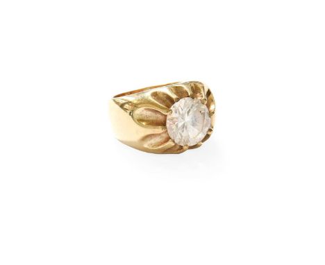A 9 Carat Gold Cubic Zirconia Solitaire Ring, the round cut cubic zirconia in a yellow claw setting, to a plain polished shan