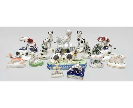 A Collection of Early 19th Century English Pottery Animals Including: a creamware model of a recumbant dalmation, a Staffords