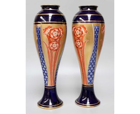 A Pair of James Macintyre &amp; Co. Pottery Vases, designed by William Moorcroft, late 19th century, of slender baluster form