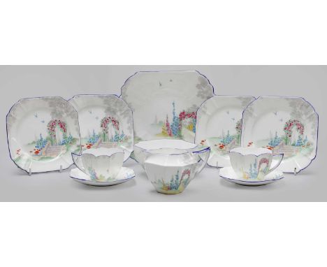 A Shelley Porcelain 'Queen Anne' Part Teaset, decorated in ''Archway of Roses'' Pattern (one tray)Bowl cracked. Some light ge