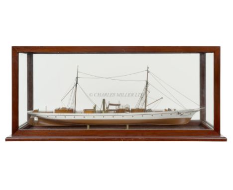 A MODEL OF THE STEAM YACHT VENUS, CIRCA 1902the 40in. carved hull painted tan below the waterline, brass portholes, single sc