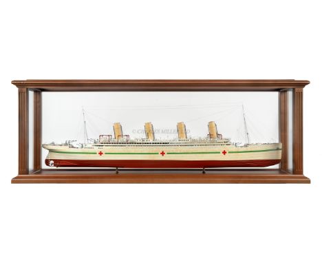 A 1:200 SCALE MODEL OF H.M.H.S. BRITANNIC [1914]the 52in. laminated and carved hull with simulated plating and finished in ho