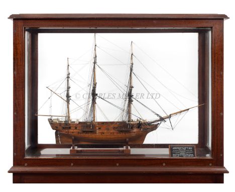 Ø A RARE WOOD AND WHALEBONE MOUNTED DOCKYARD APPRENTICE MODEL FOR A WHALER, CIRCA 1820a 22in. hull, planked and pinned with c