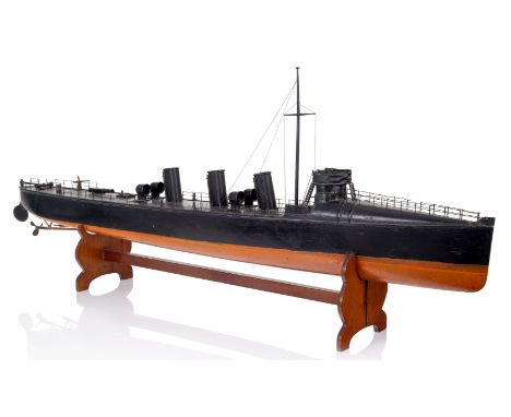 AN ELECTRIC POND MODEL FOR A TORPEDO BOAT OF CIRCA 1890, MODELLED CIRCA 192058in. hull carved from the solid, and finished wi