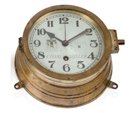 A KRIEGSMARINE U-BOAT BULKHEAD CLOCKthe 6¼in. silvered dial marked with Kriegsmarine device numbered 16742 / N, black spade h