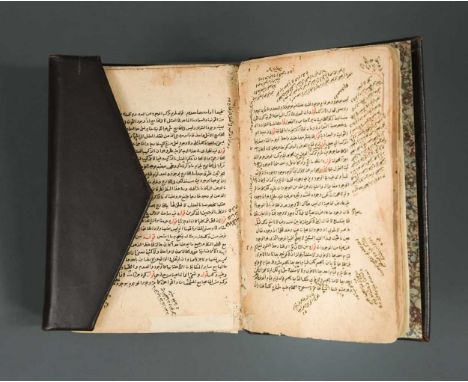 Arabic manuscript on paper, 164 leaves, approximately 23 lines to the page written in two different hands of naskhi and nasta