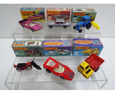 Matchbox - Six boxed Matchbox Superfast diecast vehicles. Lot includes Matchbox #18 Hondarora; #26 Site Dumper; #35 'Rola-Mat