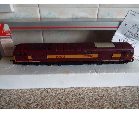 Lima - an OO gauge diesel electric locomotive, class 60 Aberddewan Aberthaw op no 60037 EWS maroon and yellow livery # L20502