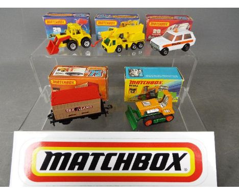 Matchbox - Five boxed Matchbox Superfast diecast vehicles. Lot includes Matchbox #12 Big Bull; #20 'Rola-Matics' police Patro