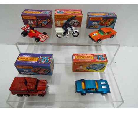 Matchbox - Five boxed Matchbox Superfast diecast vehicles. Lot includes Matchbox #4 Pontiac Firebird; #16 'Rola-Matics' Badge