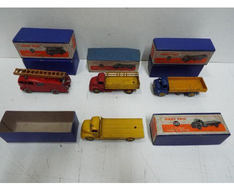 Dinky - A collection of 4 boxed 1950s Dinky lorries including # 522 Big Bedford lorry, # 533 Leyland Cement wagon, # 555 Comm