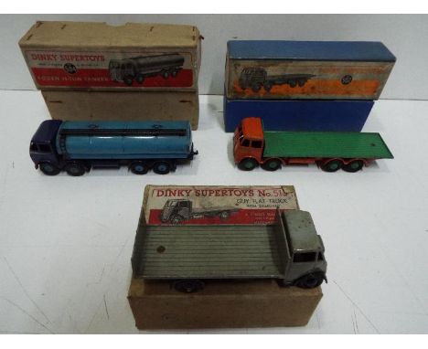 Dinky - A group of 3 boxed 1950s Dinky lorries including # 502 Foden flat truck, # 504 Foden 14 ton tanker, # 513 Guy flat tr