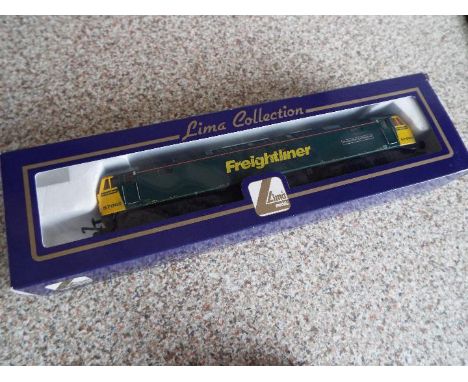 Lima Collection - an OO gauge class 57 diesel electric 'Freightliner Excellence' locomotive op no 57005 with green and yellow