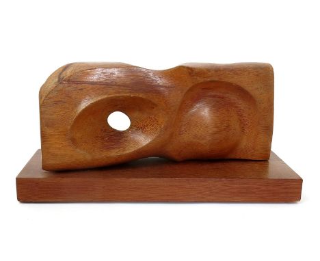 A carved oak abstract sculpture in the manner of Gertrude Hermes, abstract form with carved aperture, on rectangular oak base