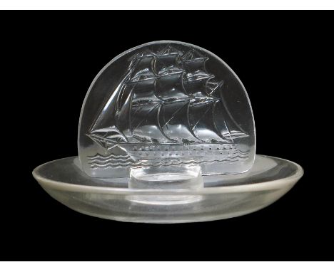 'Caravelle' no.312 a Lalique clear glass cendrier designed by Rene Lalique, and two other 'Caravelle' clear and frosted glass