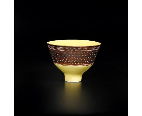 ‡ Dame Lucie Rie DBE (1902-1995) a fine, early porcelain bowl, flaring footed form, glazed yellow to the foot and interior, w