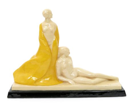A pottery figure group cast from a model by G Deblaize, on rectangular base, modelled as a reclining nude woman resting again