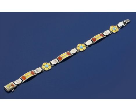 A James Fenton silver and enamel bracelet, cast with alternate flower and geometric panels, enamelled in red, yellow and blue