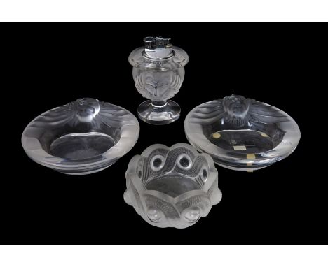 'Tete de Lion' a modern Lalique clear and frosted glass table lighter and two cendrier, and a Lalique 'Gao' cendrier, a Galle