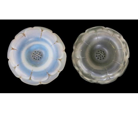 'Louise' no.301 a Lalique clear and frosted glass cendrier designed by Rene Lalique, with black enamel decoration and three o