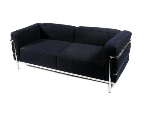 A modern Cassina LC2 chrome metal two seat sofa originally designed by Le Courbusier, with dark blue padded cushions, 165cm. 